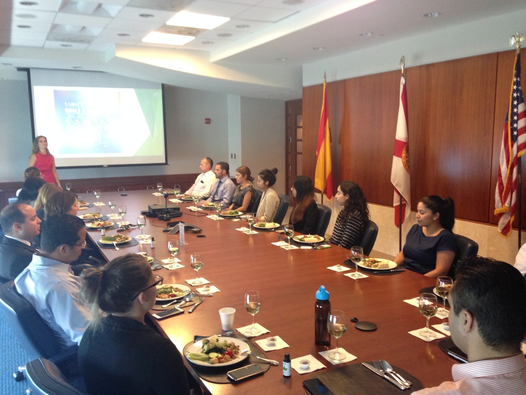 Corporate lunch and learn wellness session in executive boardroom